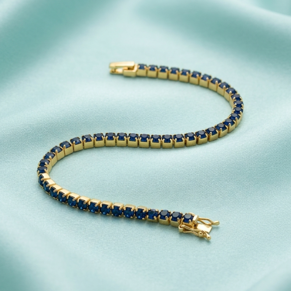Bracciale Tennis Aqua – Acciaio Placcato Oro con Cristalli Blu