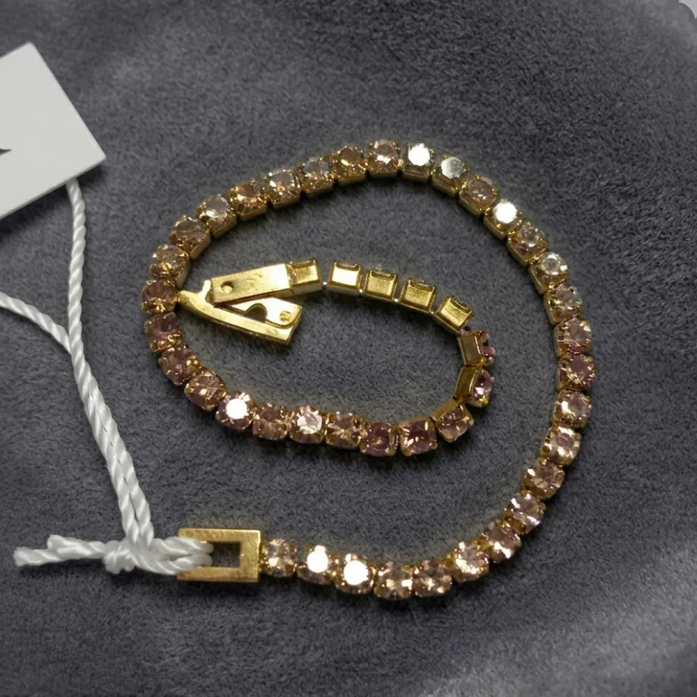 Bracciale Tennis Aqua – Acciaio Placcato Oro con Cristalli Champagne