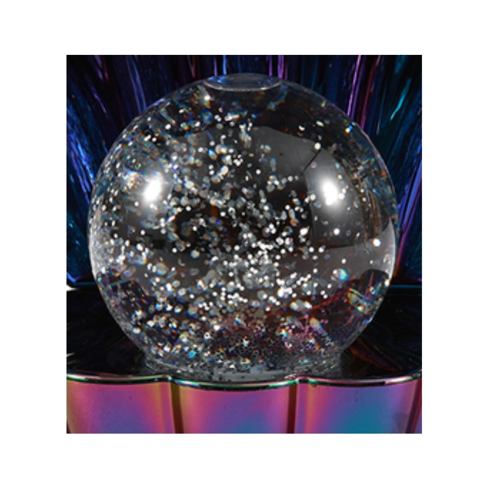Lampada Conchiglia iTOTAL – dettaglio perla trasparente con glitter in movimento