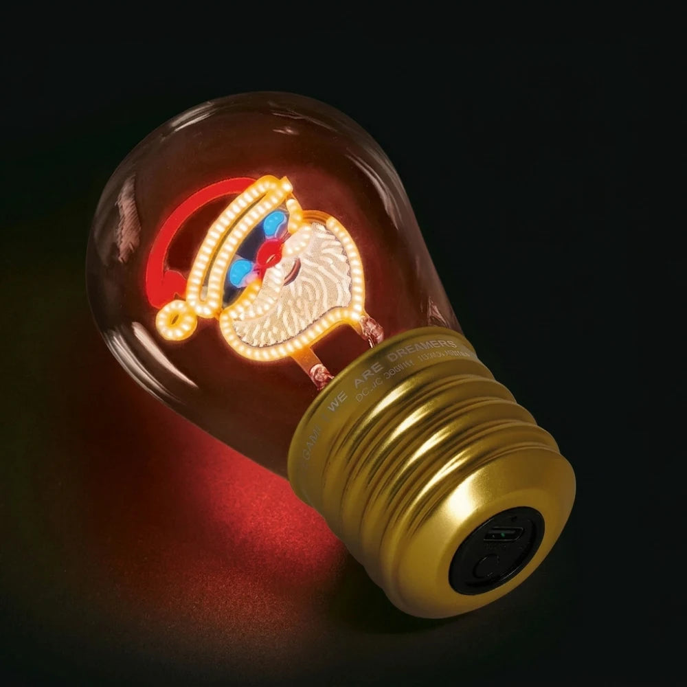 Lampada decorativa Legami a forma di lampadina con Babbo Natale luminoso e base dorata
